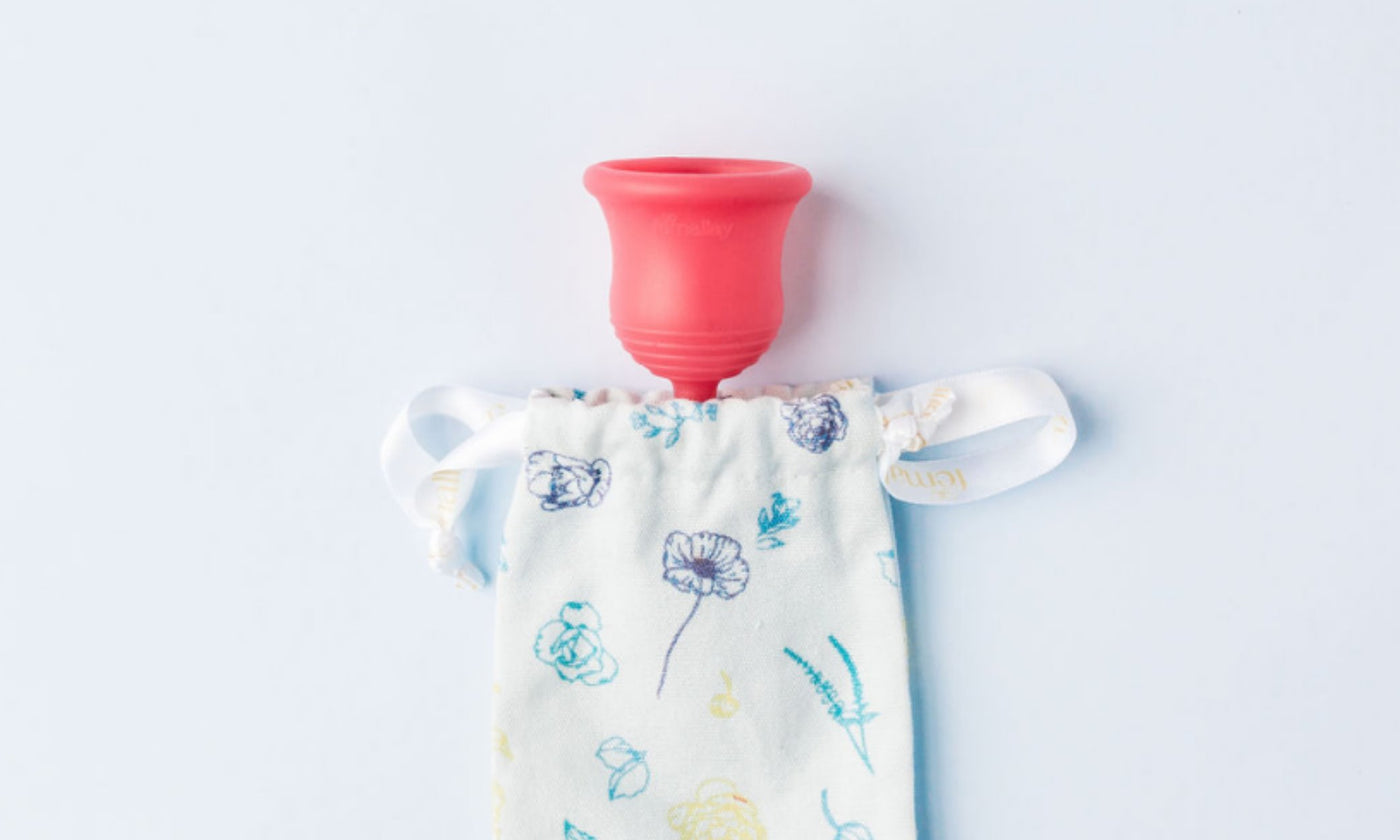 Pink Menstrual Cup in floral carrying bag